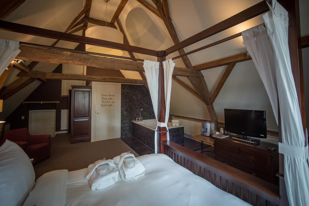 Hotel Het Raedthuys Sint-Maartensdijk Extérieur photo