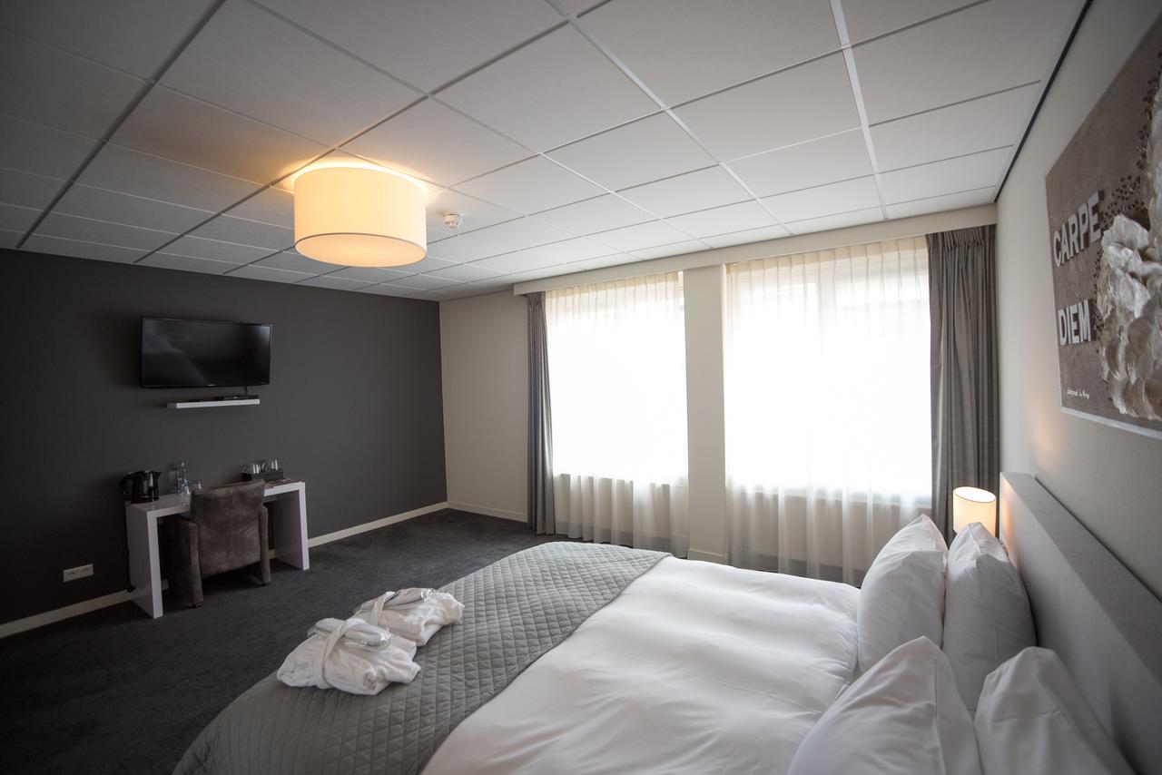 Hotel Het Raedthuys Sint-Maartensdijk Extérieur photo
