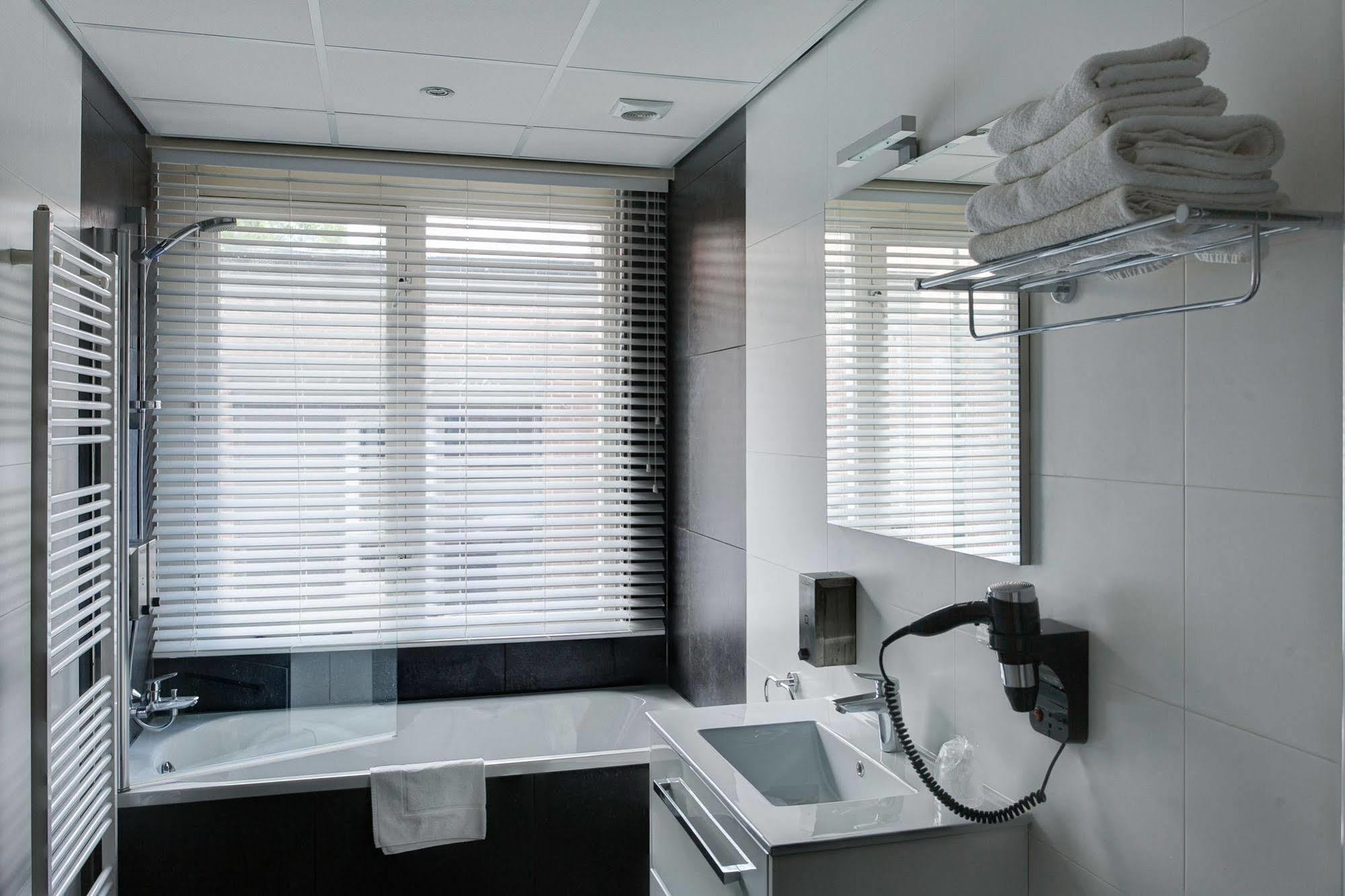 Hotel Het Raedthuys Sint-Maartensdijk Extérieur photo